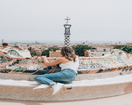 Woman taking a walk break in a park in Barcelona